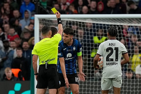 Yellow card shown to Atalanta's Berat Djimsiti 